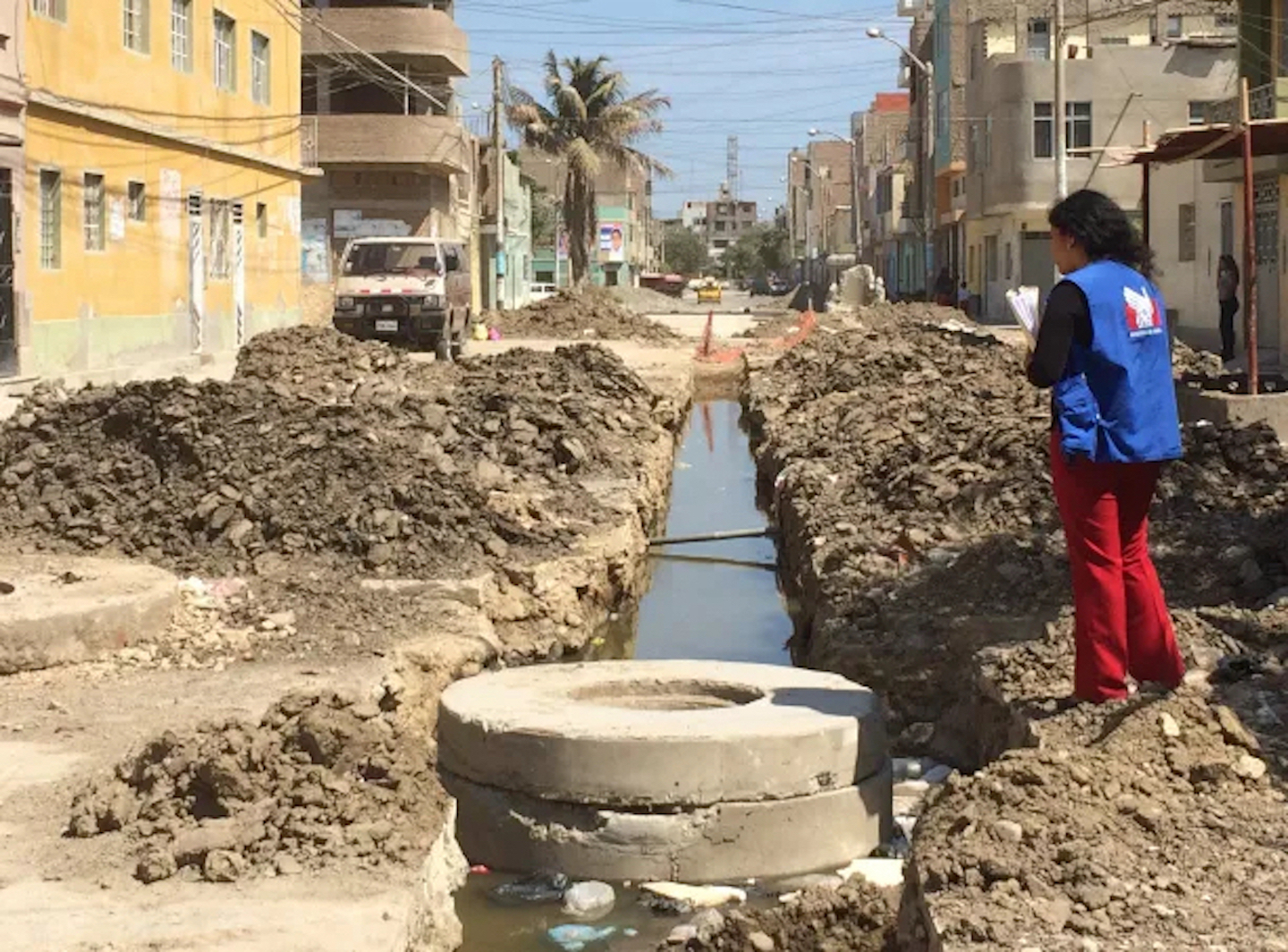 A road in Peru with an open sewerage project going through it