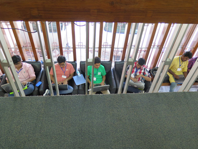 Policy Hack participants working as seen from above.