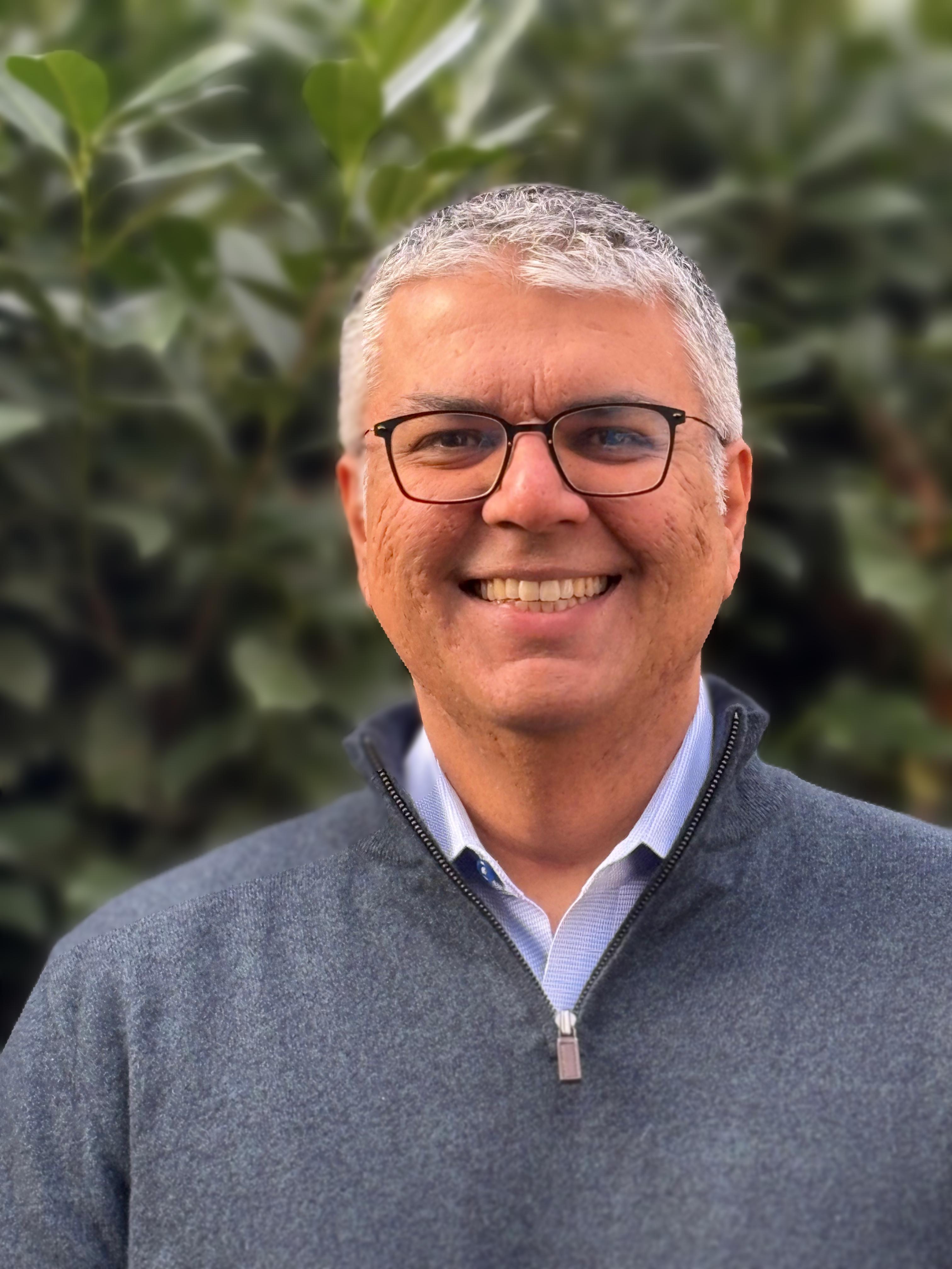 Headshot of Amer Hasan