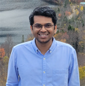 A man in a blue shirt
