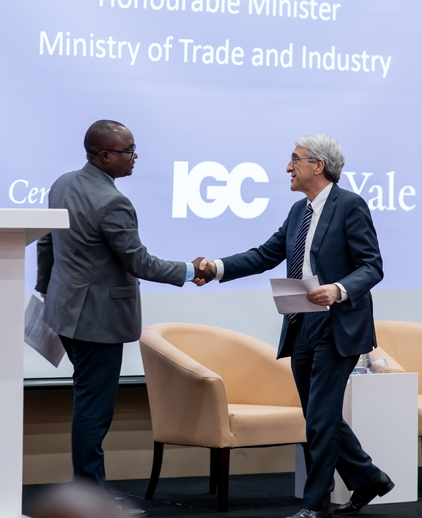 Dr. Jean Chrysostome Ngabitsinze, Rwanda’s Minister of Trade and Industry, shaking hands with Peter Salovey