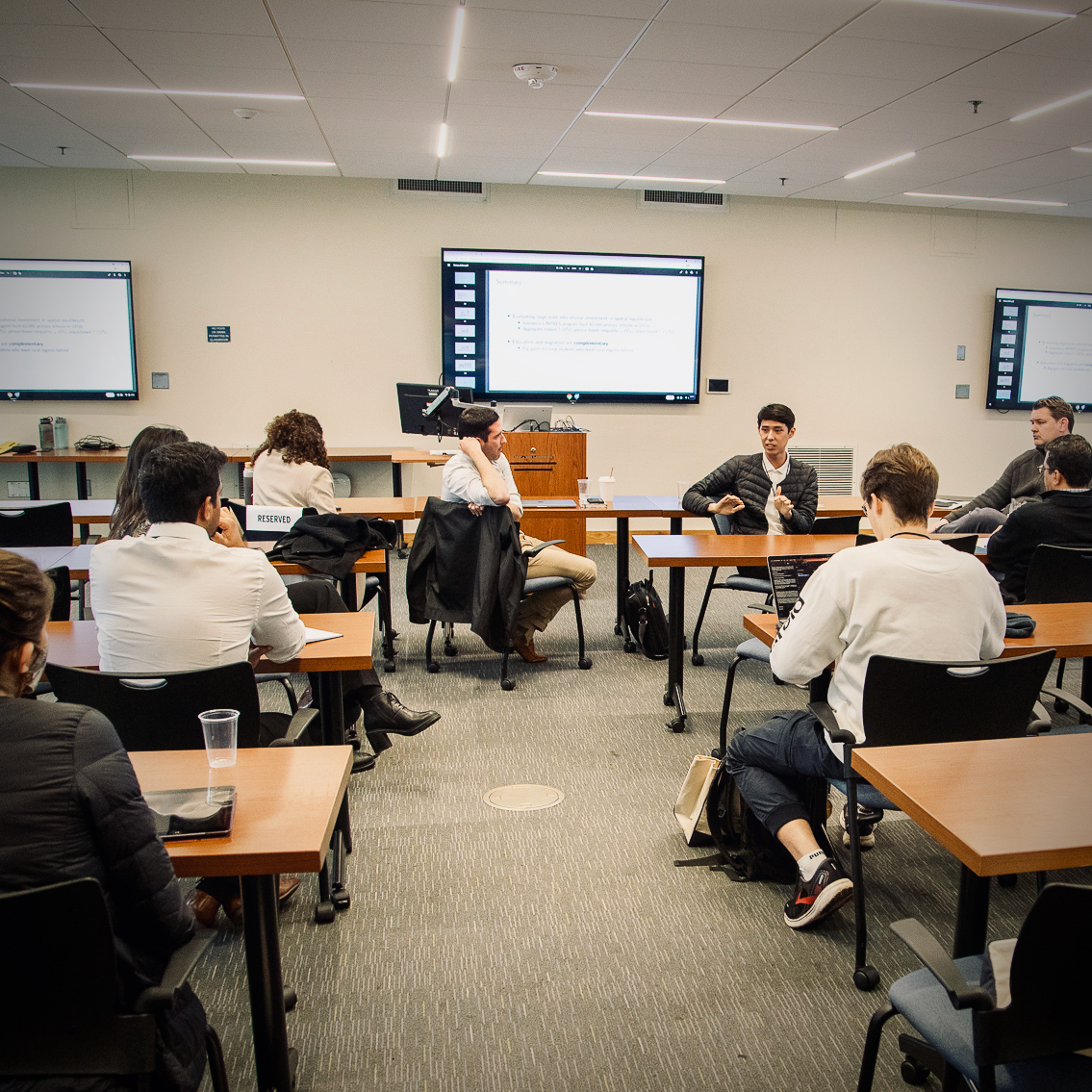 An economist speaking to a group