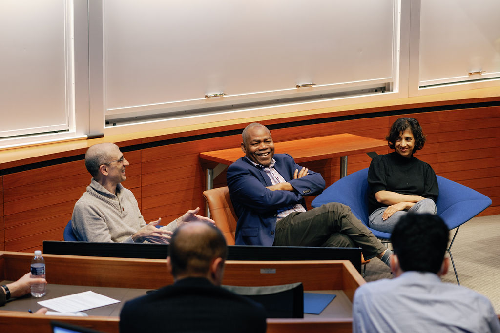 "Gerard Padro i Miquel. Leonard Wantchekon, and Rohini Pande present at a panel"