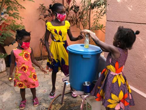 Photo: Young children washing their hands at their home in Dakar, Senegal, last month.Credit...Krista Larson/Associated Press