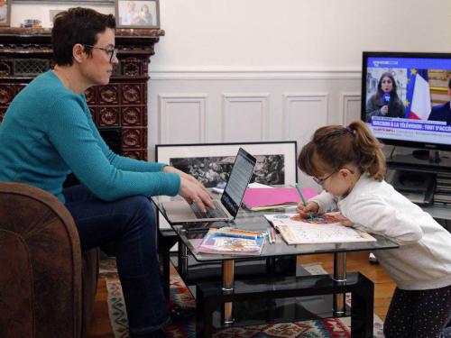 Photo: Parent and child working at home