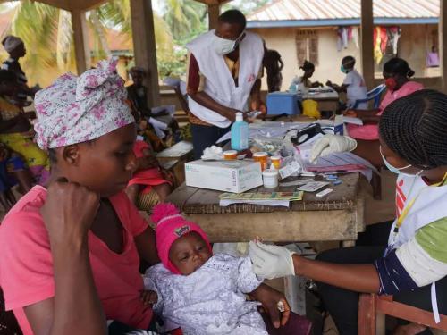 Photo: Mobile clinic in Sierra Leone in July 2020/ Saidu BahAFP via Getty Images