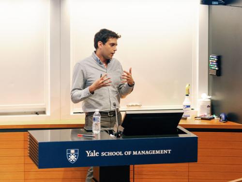 Yusuf Neggers presenting at the 2022 Kuznets Mini-Conference