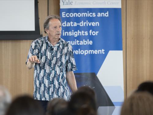 Chris Udry presents at the 2024 Kuznets Memorial Lecture