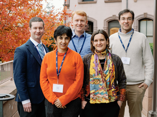 Photo of 5 presenters from the Yale Climate, Energy and Economic Growth Conference, standing outside for a picture. 