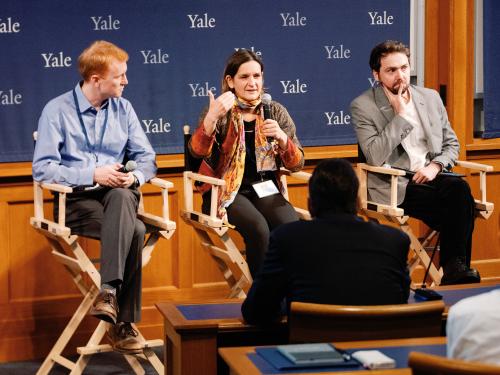 Nicholas Ryan, Esther Duflo and Lucas Chancel speak on a panel addressing the climate inequality crisis at the Yale Climate, Environment & Economic Growth Conference on November 9, 2023.