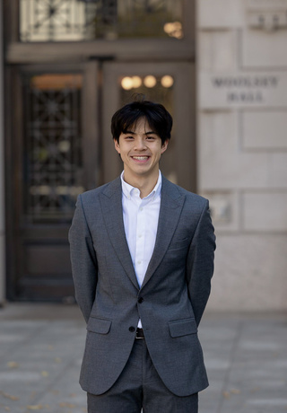 A man in a grey suit