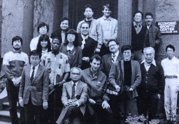 Professors and International students on the steps of EGC in the 90s.