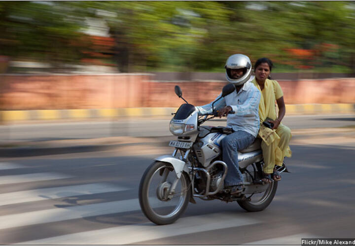 Man and woman on motorbike