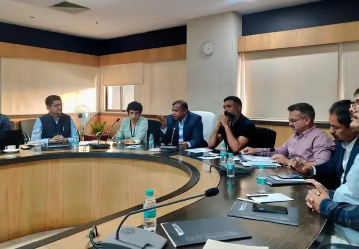 Researchers sitting around a conference table