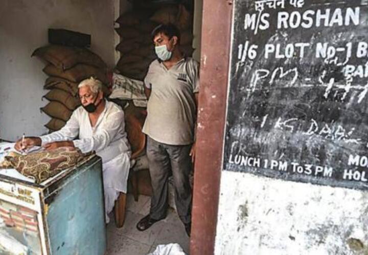 two men working in a ration shop