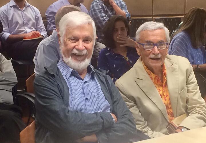 Bacha (left) and Clóvis Cavalcanti, his colleague and former roommate during his Yale years, at a seminar at the Casa das Garças Institute for Economic Policy Studies in 2019.