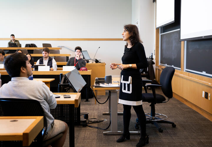Image showing Eliana La Ferrara teaching a seminar at Harvard Kennedy School. 