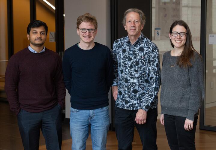 Conference organizers (L-R) Sagar Saxena and Patrick Agte, both EGC  Postdoctoral Associates at EGC; Christopher Udry, the Robert E. and Emily King Professor of Economics at Northwestern University; and Lauren Falcao Bergquist, Assistant Professor of Economics and Global Affairs and EGC affiliate.