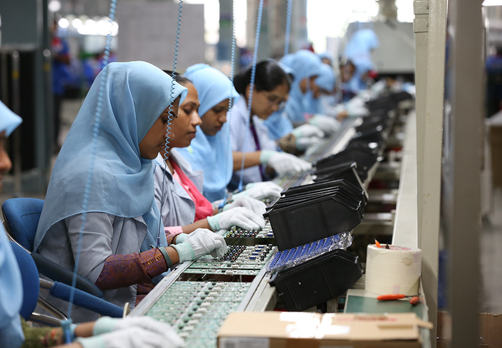 Women working on a manufacturing process