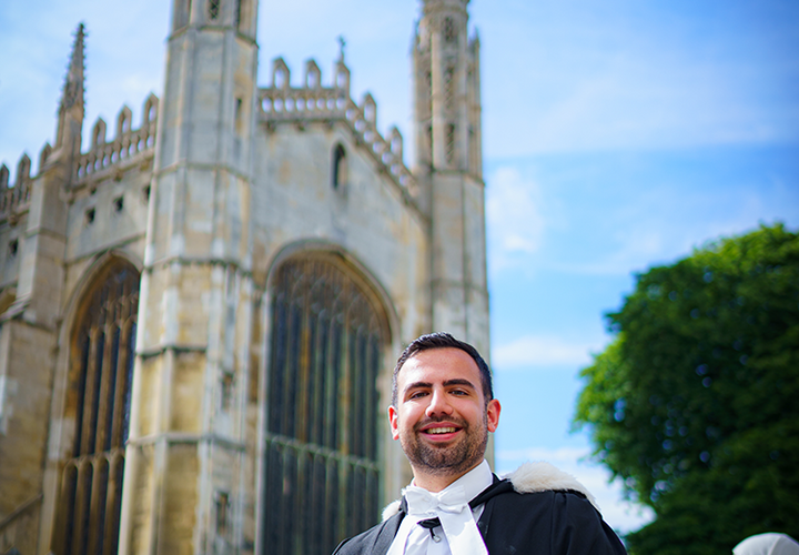 Jaimin Shah standing in front of a tall building