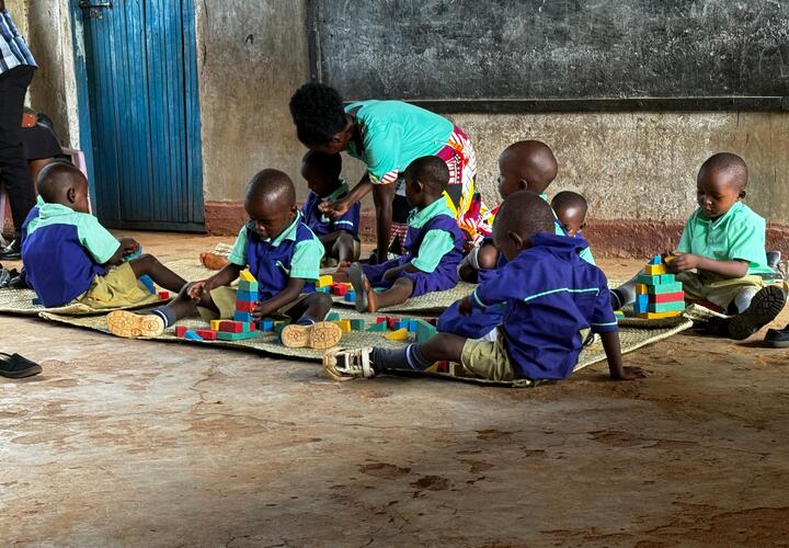 Kids engaged in play-based activities in a preschool classroom in Kenya's Tharaka Nithi County.