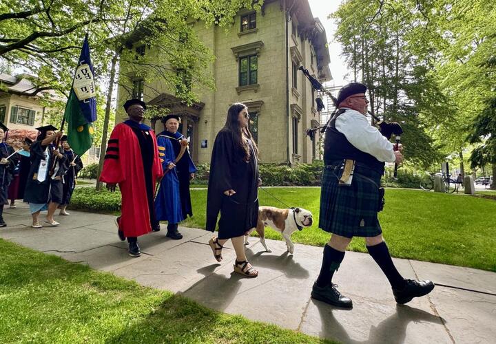 Graduates walking around the Yale campus as part of the graduation ceremony