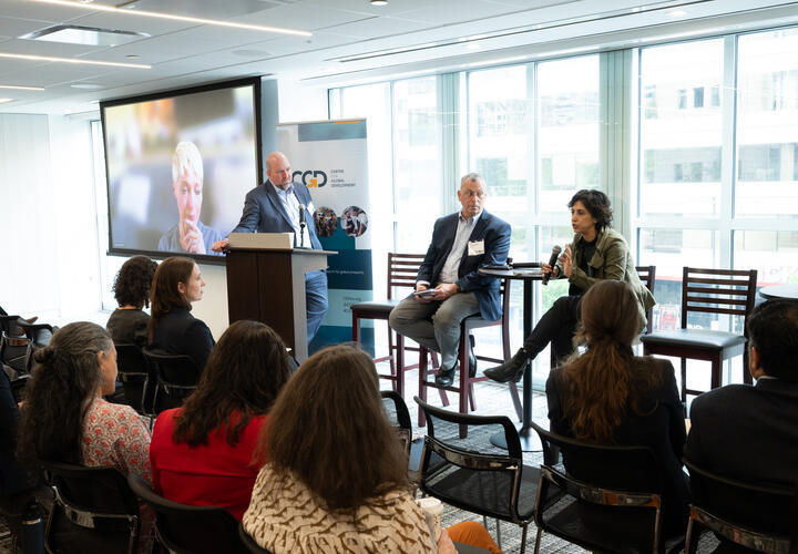 A wide show of panel speakers during a discussion
