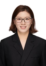 A woman in a dark jacket