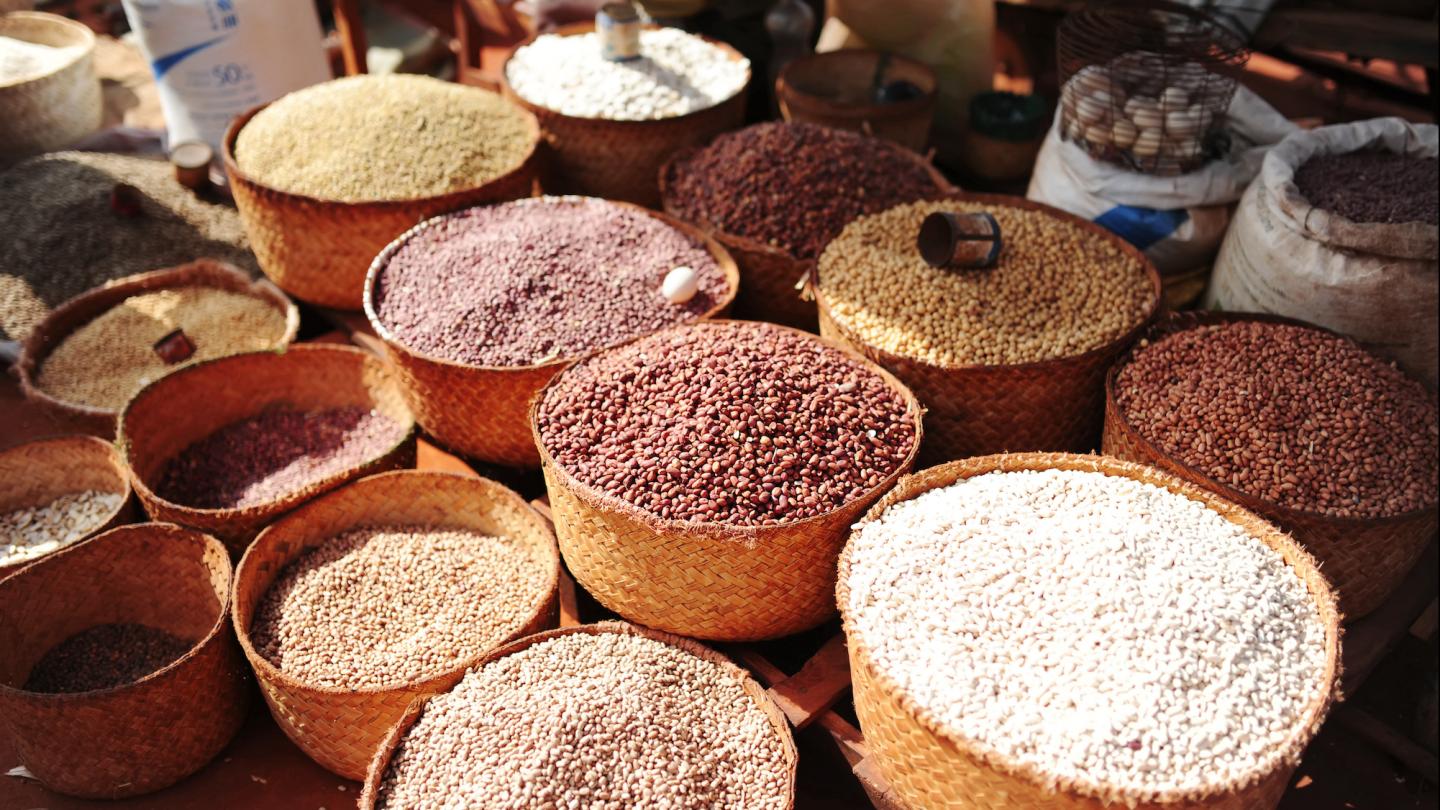 Baskets of different grains in a Mexican market