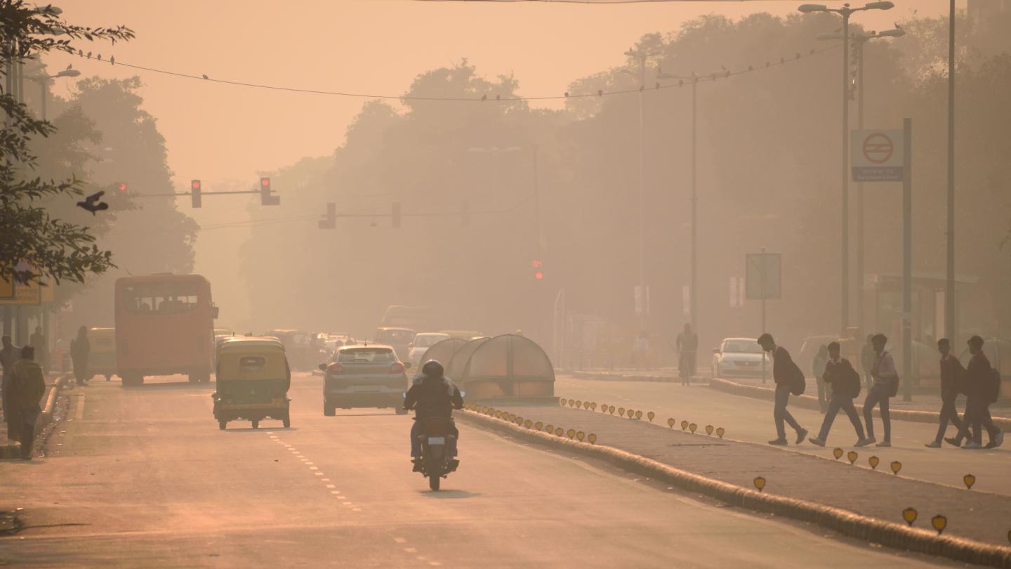 Vehicle driving through smog