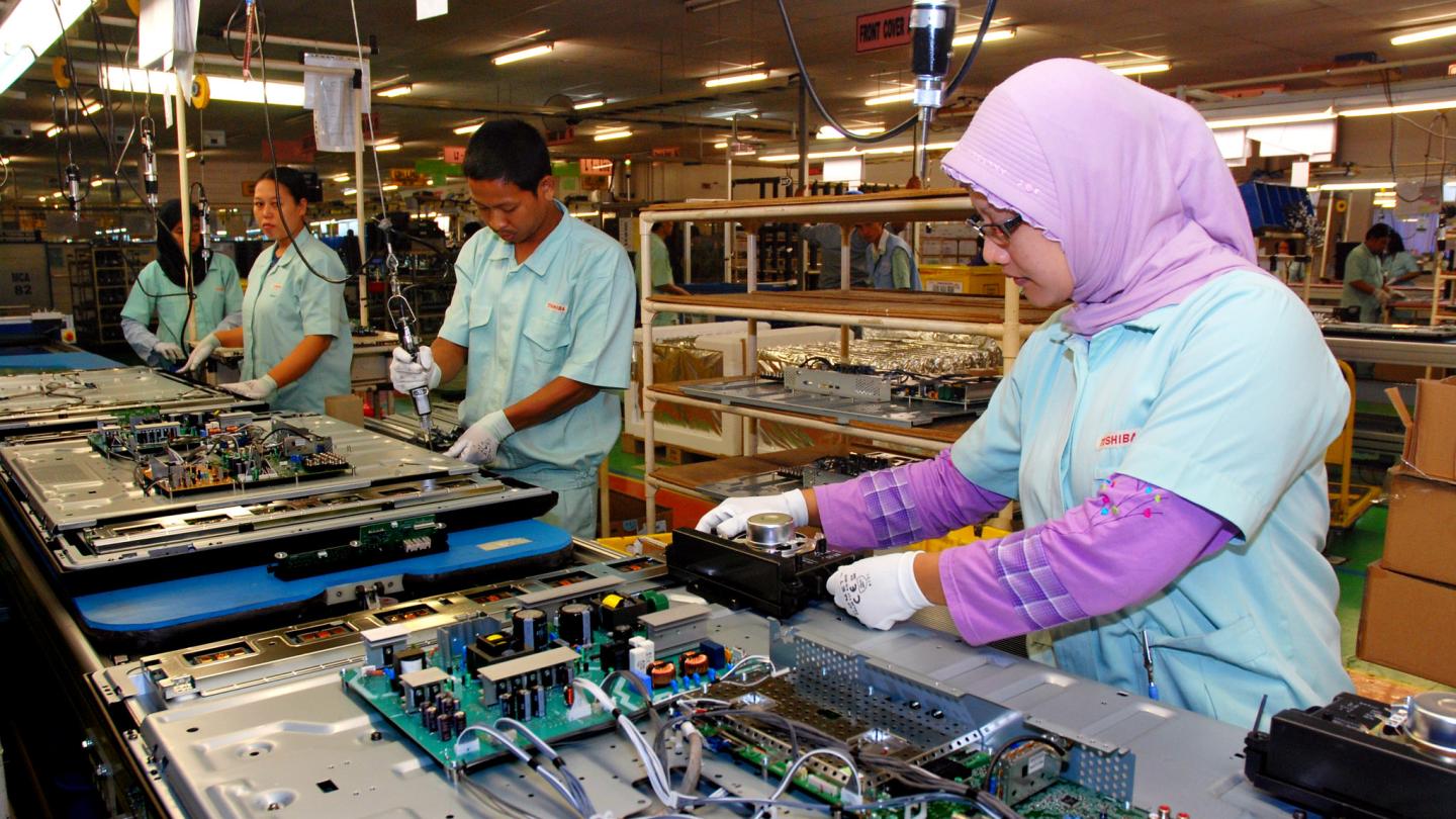 Workers working in line at the in Global Supply Chains (Indonesia).